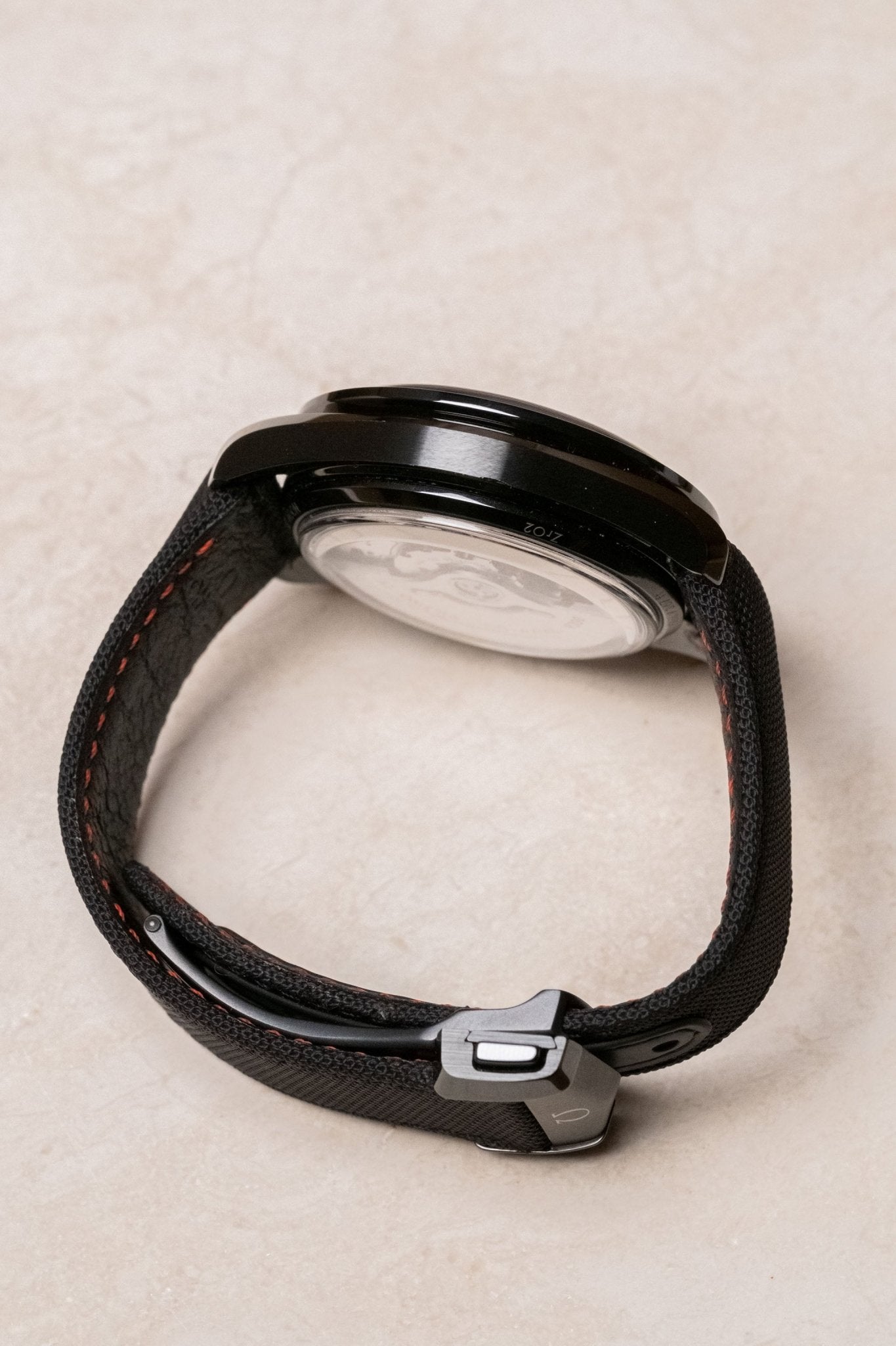 2014 OMEGA Speedmaster Ceramic OG “Dark Side of the Moon” 311.92.44.51.01.003 case profile side view