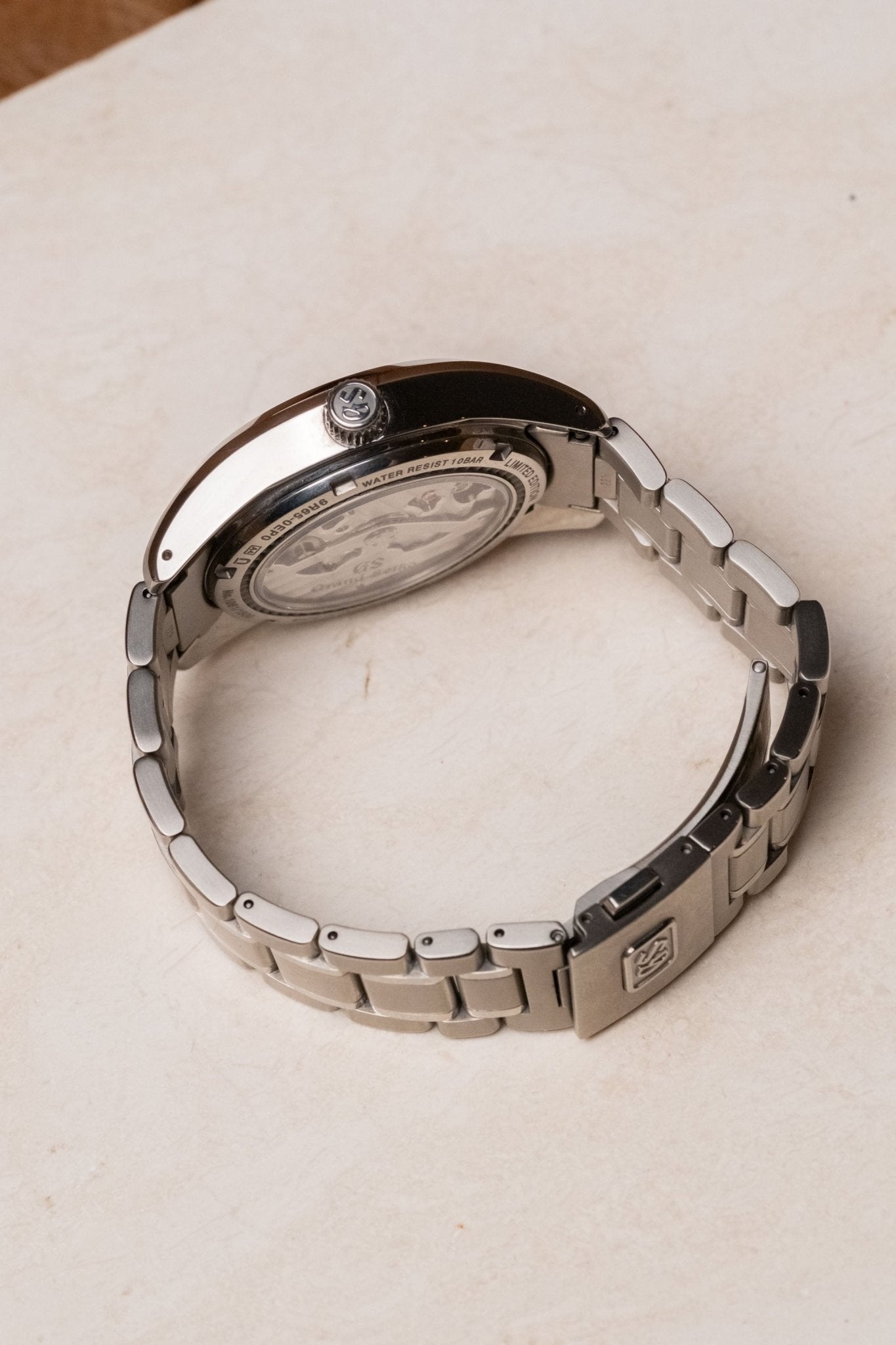2024 Grand Seiko Heritage Collection Spring Drive 20th Anniversary Pink Snowflake SBGA497 case profile side view
