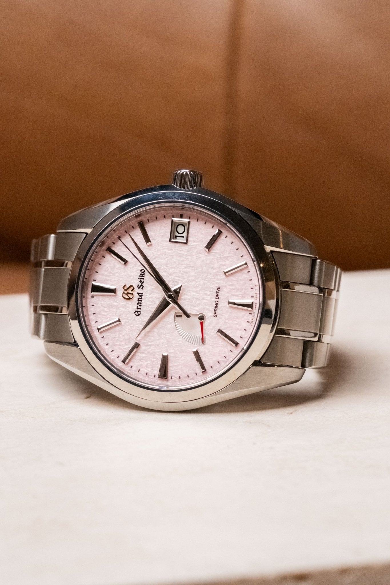 2024 Grand Seiko Heritage Collection Spring Drive 20th Anniversary Pink Snowflake SBGA497 dial detail close-up