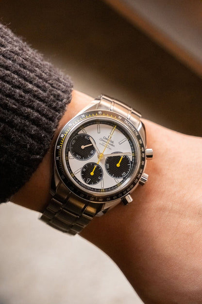 2024 OMEGA Speedmaster Racing White Dial with Yellow Accents Ref. 326.30.40.50.04.001 - Wristory