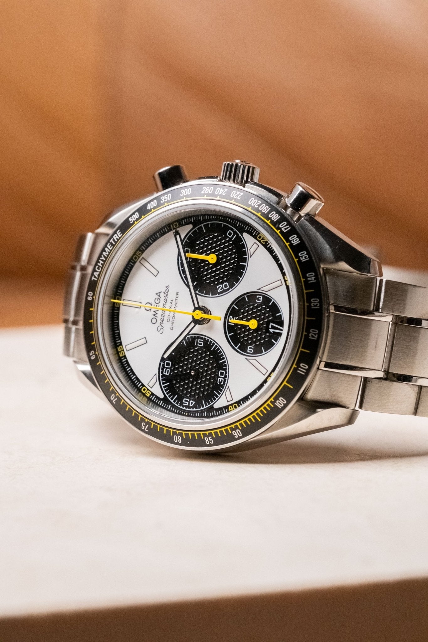 2024 OMEGA Speedmaster Racing White Dial with Yellow Accents Ref. 326.30.40.50.04.001 - Wristory