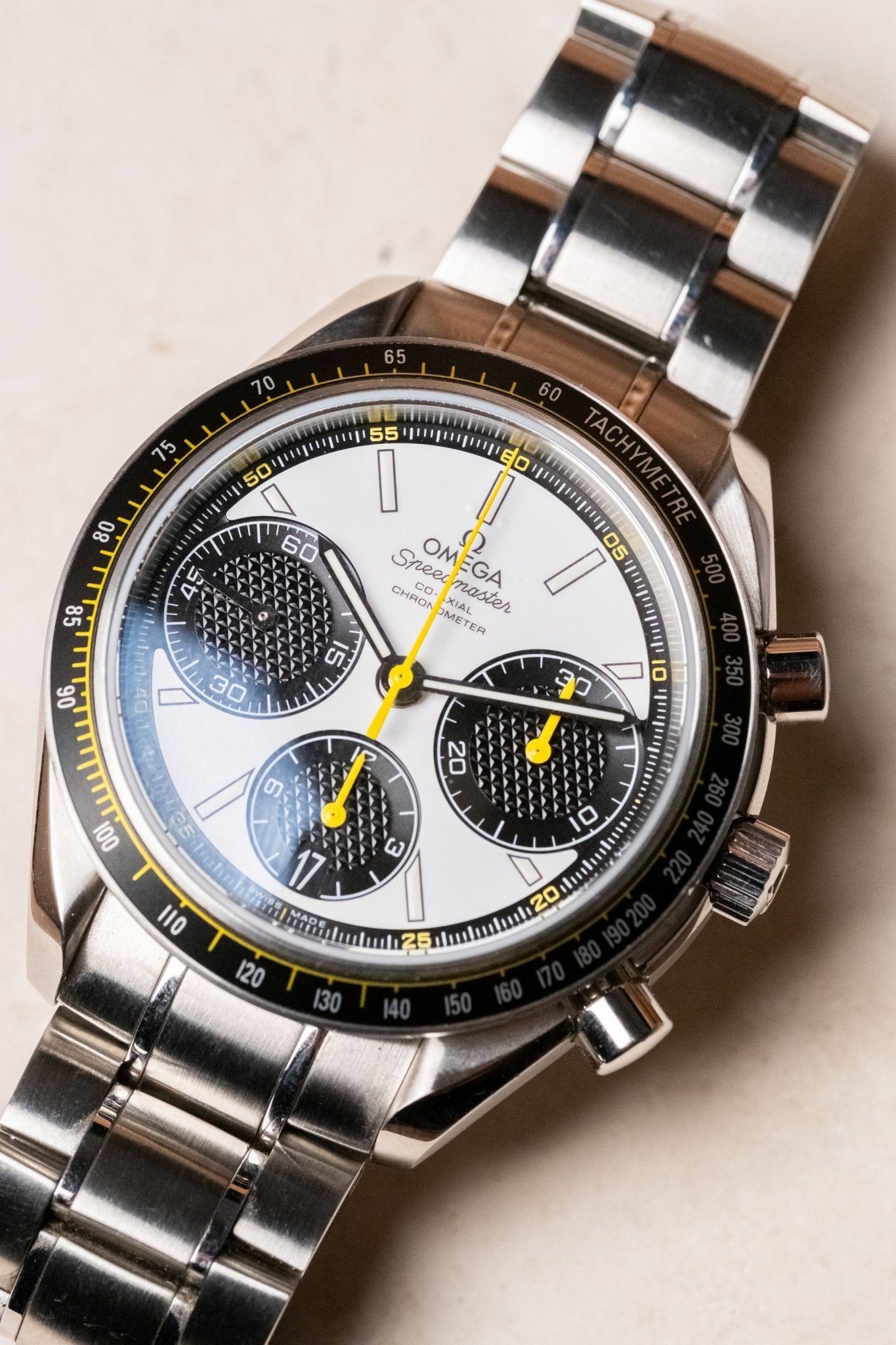 2024 OMEGA Speedmaster Racing White Dial with Yellow Accents Ref. 326.30.40.50.04.001 - Wristory