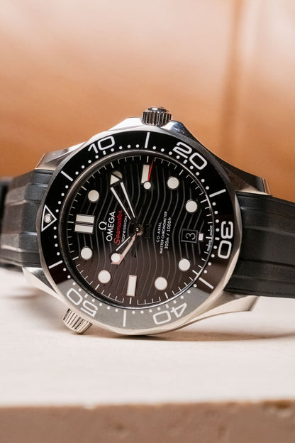 2025 OMEGA Seamaster Diver 300M Black Wave Dial on Rubber Ref 210.32.42.20.01.001 - Wristory